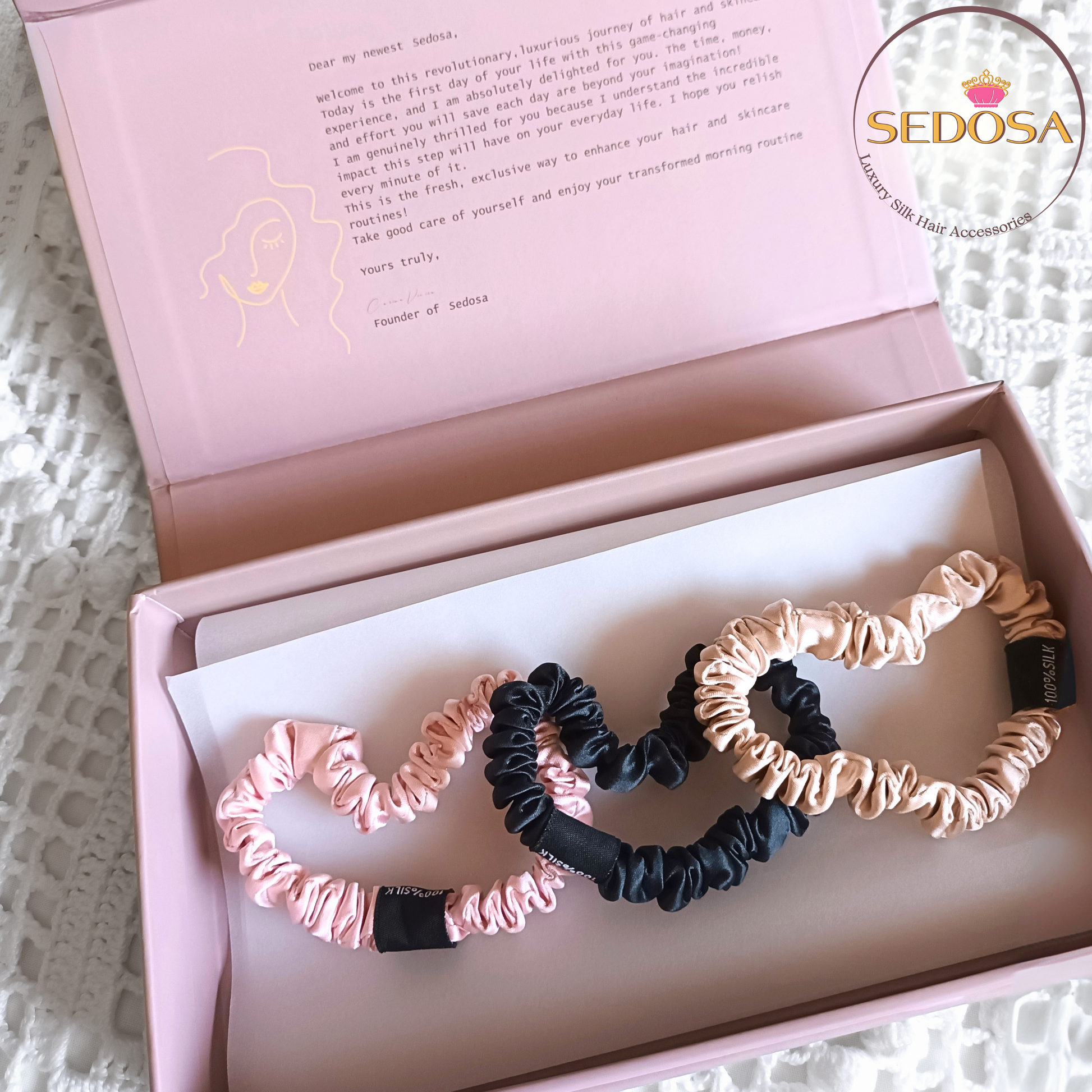 Set of hair scrunchies, size skinny, in black, pink, and caramel, in a pink box with SEDOSA branding.
